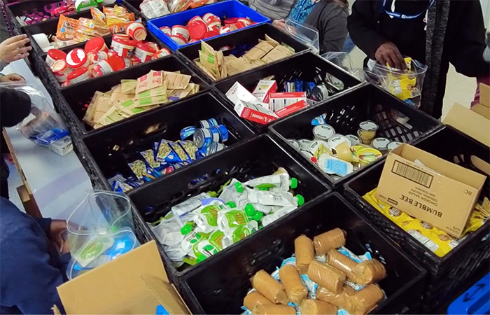 Crates of packaged food at a food bank