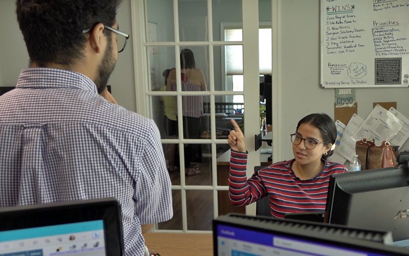 Colleagues speaking ASL