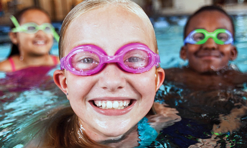 Kids swimming in pool