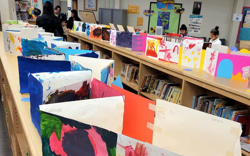 Student paintings at Paul Robeson Community School art show